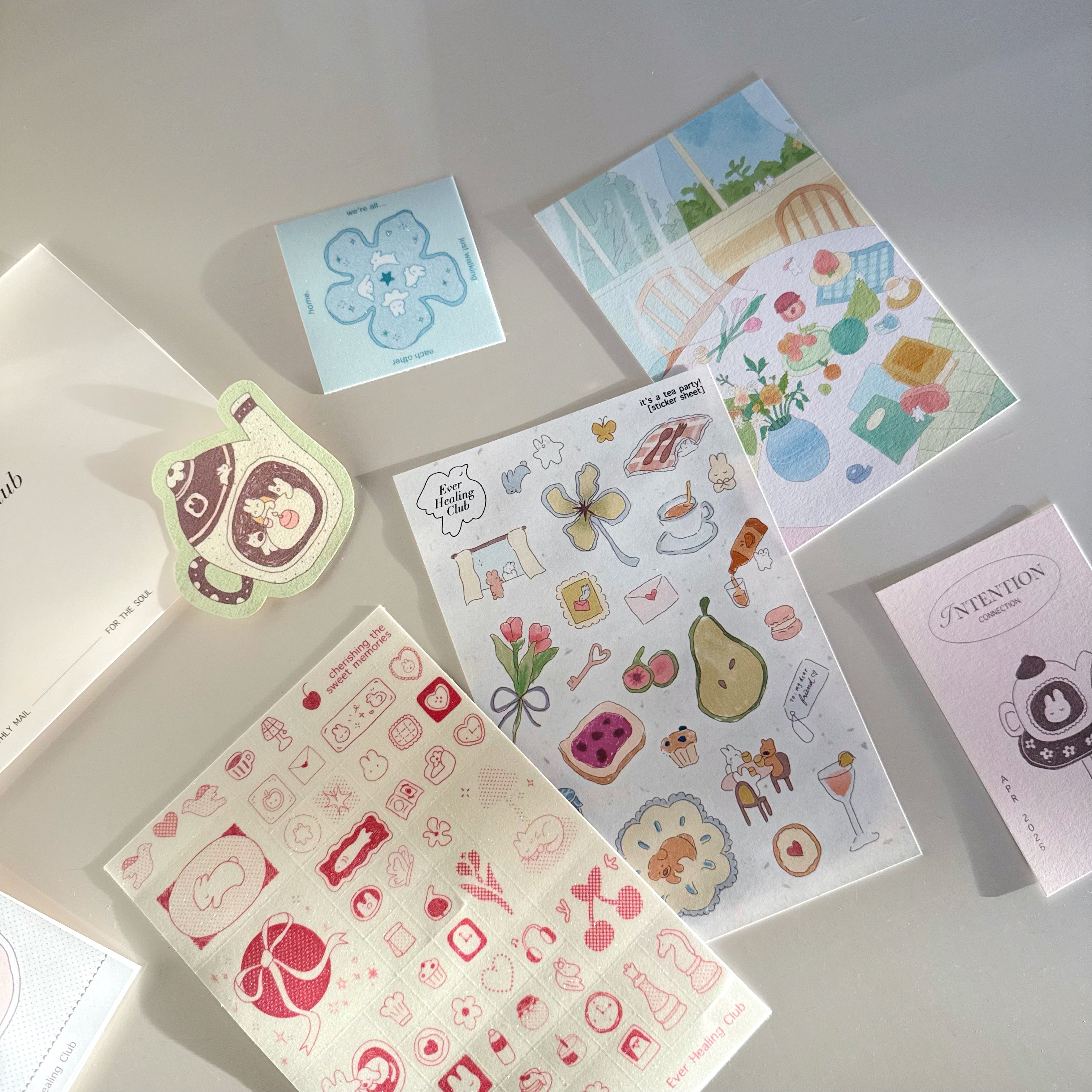 Collection of decorative stickers on a light surface. Signature