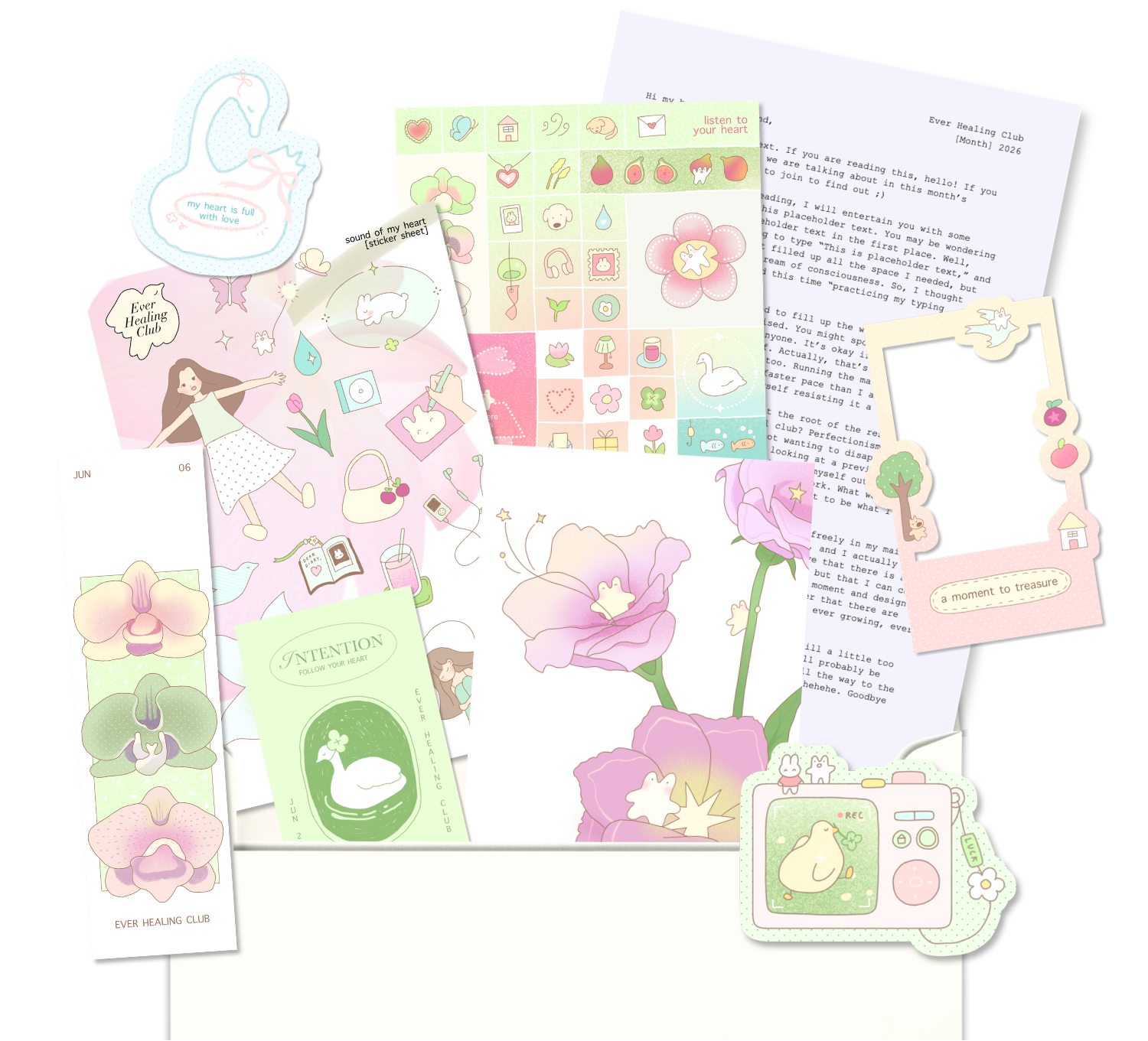 Collection of stationery items including stickers, cards, and a letter on a white background